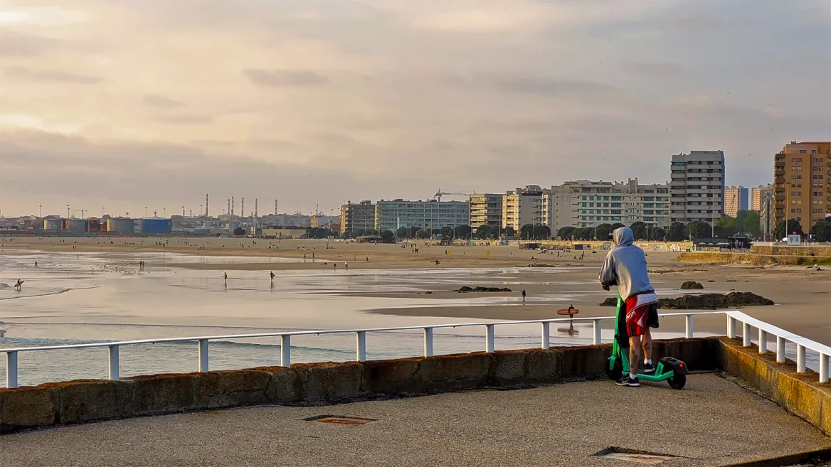 Porto beach sunset scooter